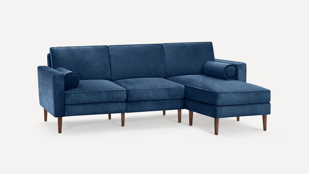 Nismaaya Blue Velvet L Shape Sofa with two resting cushion at best price